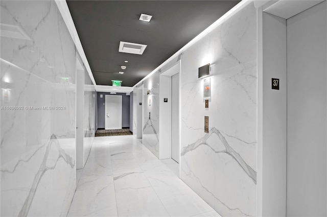 1300 S Miami Ave Unit 3704, Miami, FL 33130 - hallway featuring marble tiled flooring and elevator