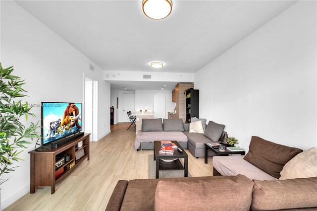 1300 S Miami Ave Unit 3704, Miami, FL 33130 - living room with light wood finished floors and baseboards