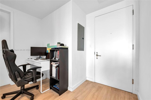 1300 S Miami Ave Unit 3704, Miami, FL 33130 - office area featuring electric panel and light wood-style flooring