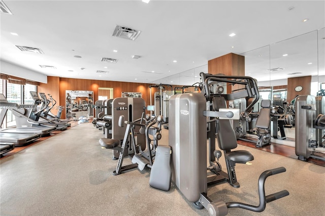 workout area with wood walls