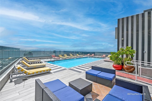 1300 S Miami Ave Unit 3704, Miami, FL 33130 - community pool featuring a deck and an outdoor living space