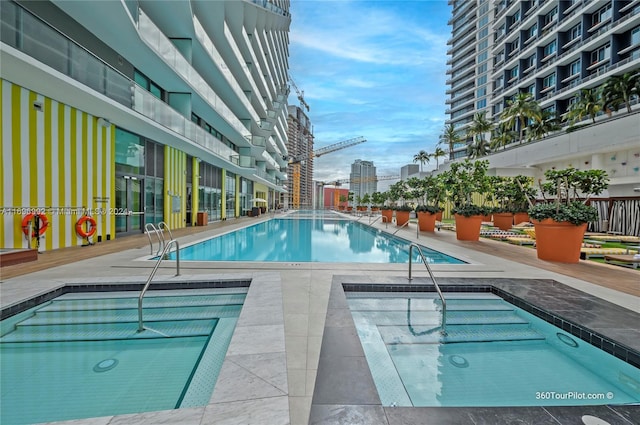 1300 S Miami Ave Unit 3704, Miami, FL 33130 - community pool with a patio and a city view