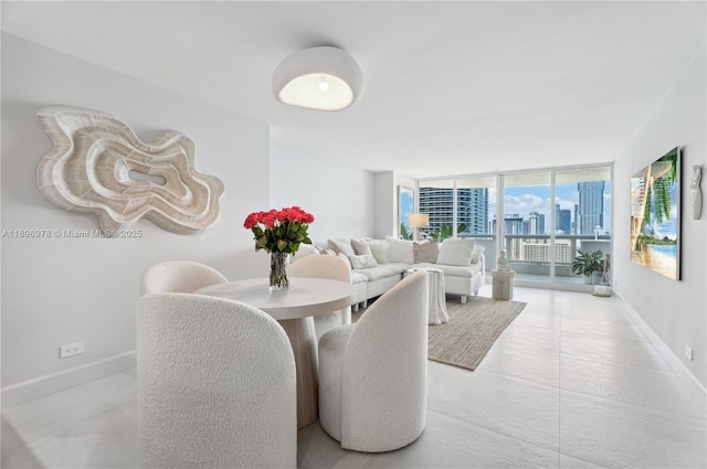 dining area featuring expansive windows