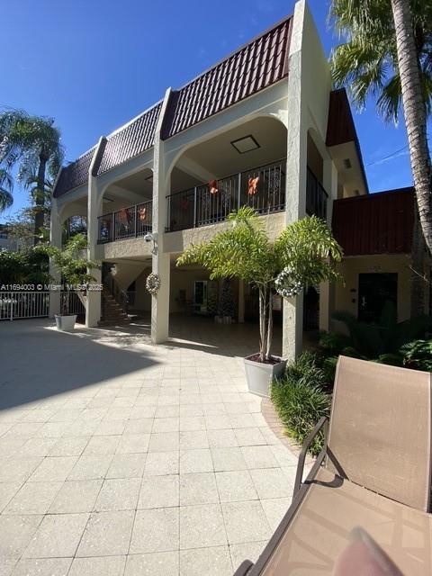 view of patio / terrace with a balcony