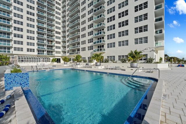pool featuring a patio area