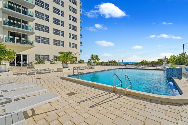community pool featuring a patio