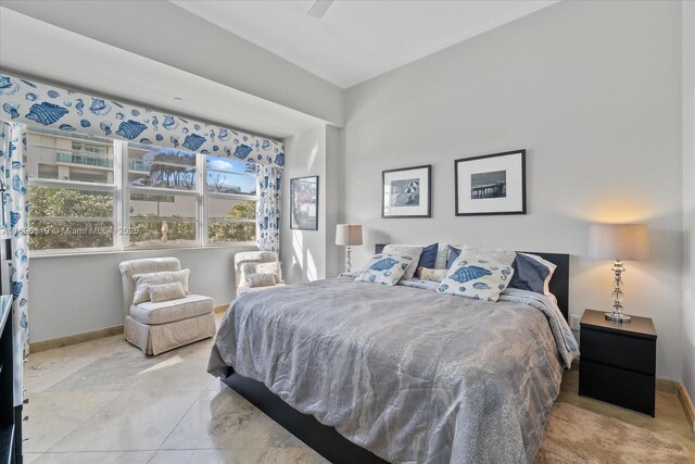 bedroom featuring baseboards