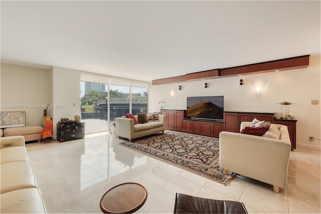 living room with light tile patterned floors