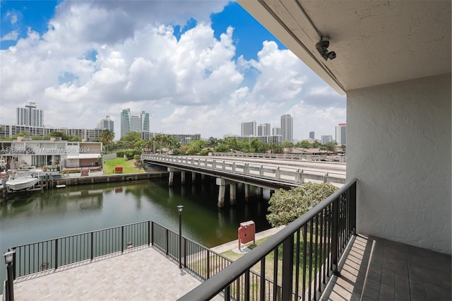 balcony featuring a water view