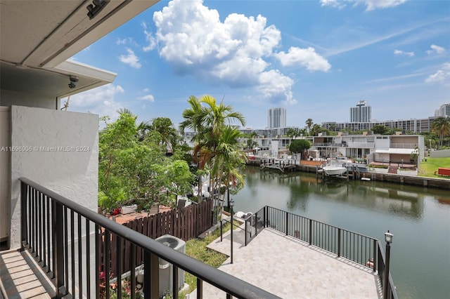 balcony featuring a water view