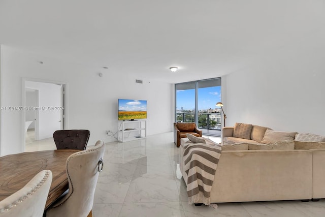 17301 Biscayne Blvd Unit 1404, North Miami, FL 33160 - living room with light marble finish flooring and expansive windows