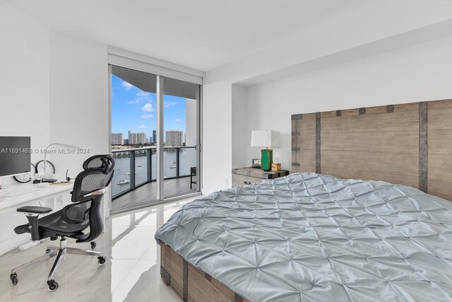 17301 Biscayne Blvd Unit 1404, North Miami, FL 33160 - bedroom featuring access to outside, a city view, a water view, and expansive windows