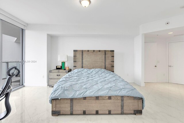 17301 Biscayne Blvd Unit 1404, North Miami, FL 33160 - bedroom with light marble finish floors