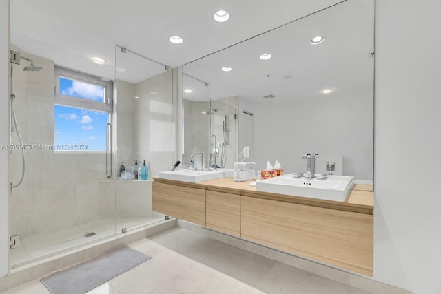 17301 Biscayne Blvd Unit 1404, North Miami, FL 33160 - bathroom featuring a stall shower, double vanity, tile patterned floors, and recessed lighting