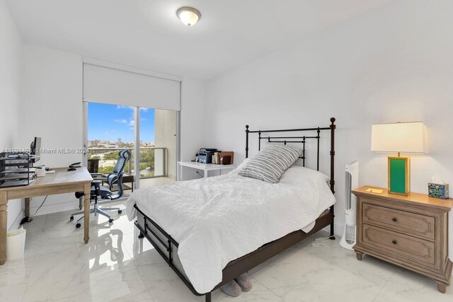 17301 Biscayne Blvd Unit 1404, North Miami, FL 33160 - bedroom featuring light marble finish flooring and a desk