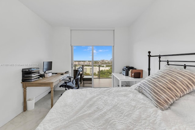 17301 Biscayne Blvd Unit 1404, North Miami, FL 33160 - bedroom with marble look tile flooring and an office area