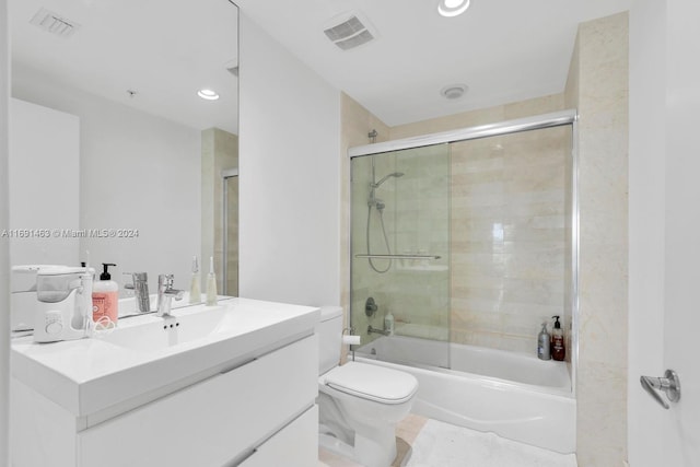 17301 Biscayne Blvd Unit 1404, North Miami, FL 33160 - full bathroom featuring vanity, toilet, combined bath / shower with glass door, and recessed lighting