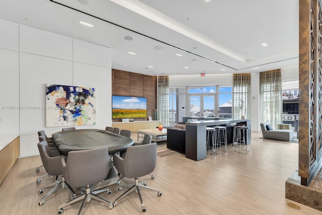 office space with light hardwood / wood-style flooring