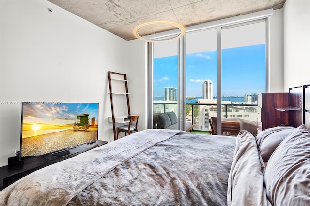 bedroom featuring expansive windows