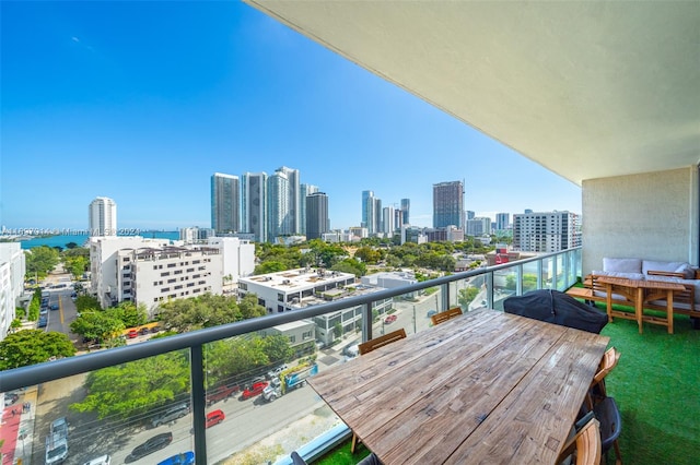 balcony featuring a water view