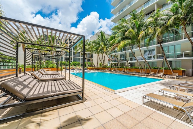 view of pool featuring a patio area and a pergola