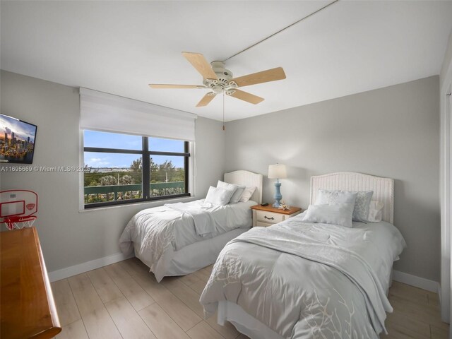 9940 S Ocean Dr Unit 508, Jensen Beach, FL 34957 - bedroom featuring light wood finished floors and ceiling fan