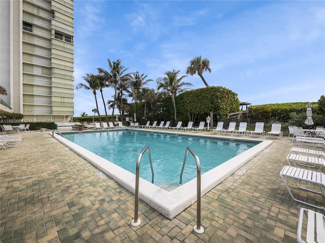 view of pool featuring a patio area