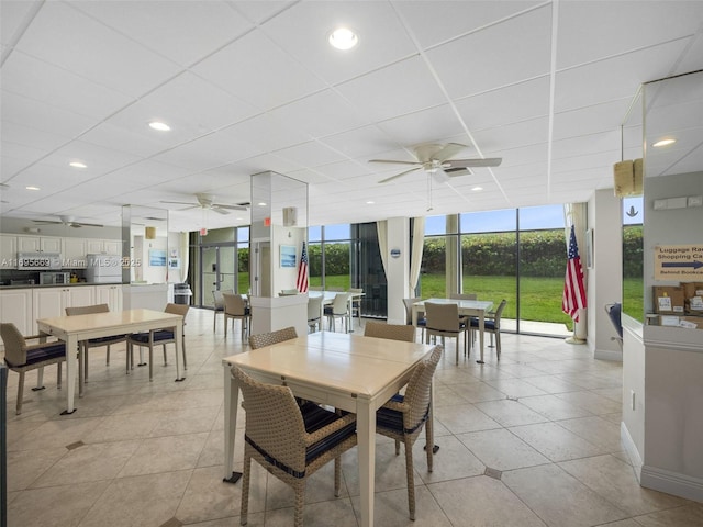 9940 S Ocean Dr Unit 508, Jensen Beach, FL 34957 - dining space featuring ceiling fan, a paneled ceiling, light tile patterned flooring, and recessed lighting
