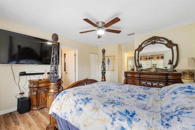 bedroom featuring ceiling fan and light hardwood / wood-style flooring