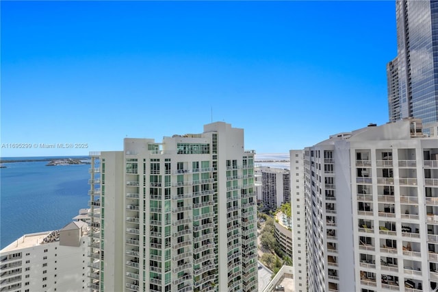 view of building exterior featuring a water view