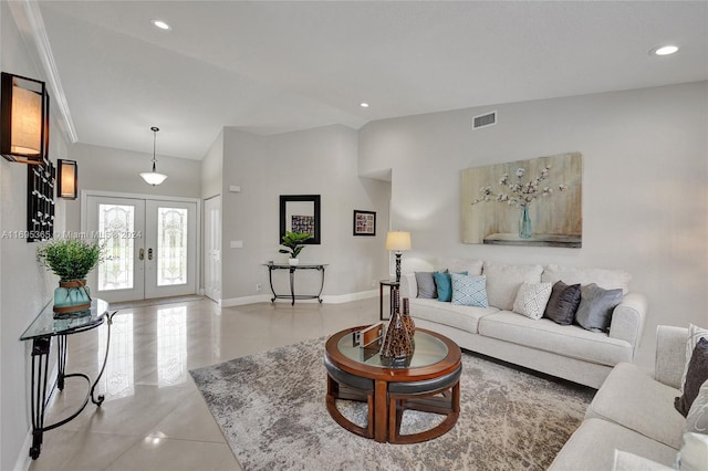 living room with light tile patterned floors and french doors