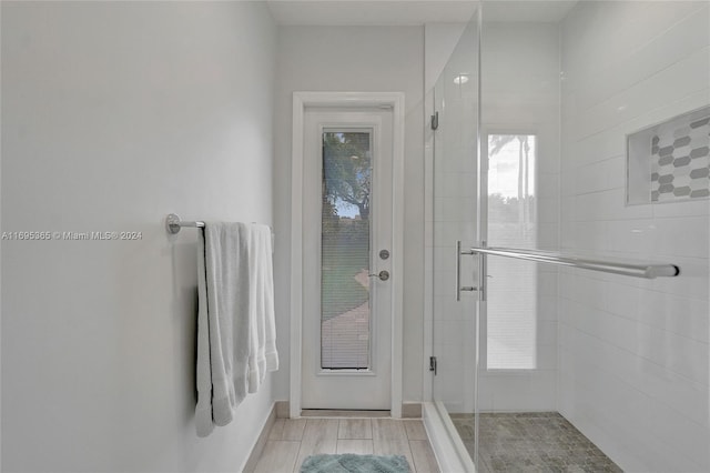 bathroom with an enclosed shower