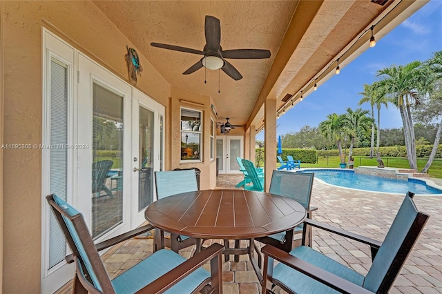 view of patio / terrace with ceiling fan and french doors