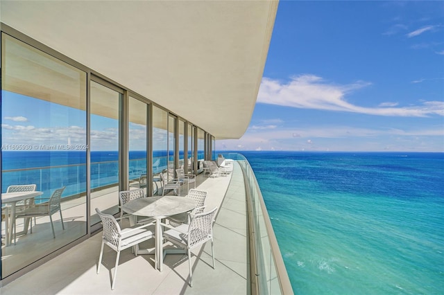 balcony featuring a water view