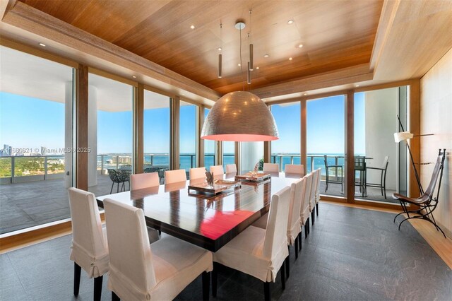 2627 S Bayshore Dr Unit 3201, Miami, FL 33133 - dining space with wooden ceiling, wood finished floors, and floor to ceiling windows