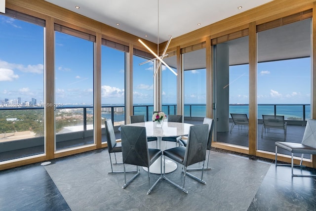 2627 S Bayshore Dr Unit 3201, Miami, FL 33133 - sunroom featuring a water view and a view of city