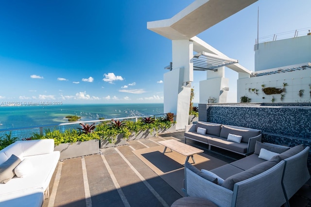 2627 S Bayshore Dr Unit 3201, Miami, FL 33133 - view of patio with a water view and an outdoor living space