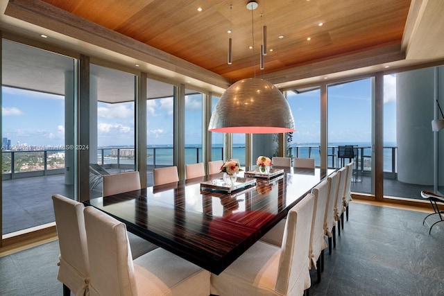 2627 S Bayshore Dr Unit 3201, Miami, FL 33133 - dining room featuring wooden ceiling, a wall of windows, plenty of natural light, and a raised ceiling