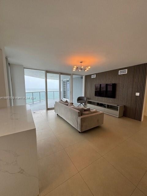 living room featuring light tile patterned flooring