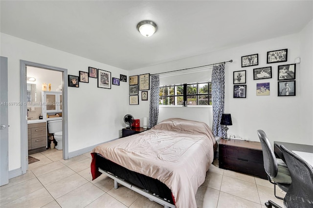 tiled bedroom with connected bathroom