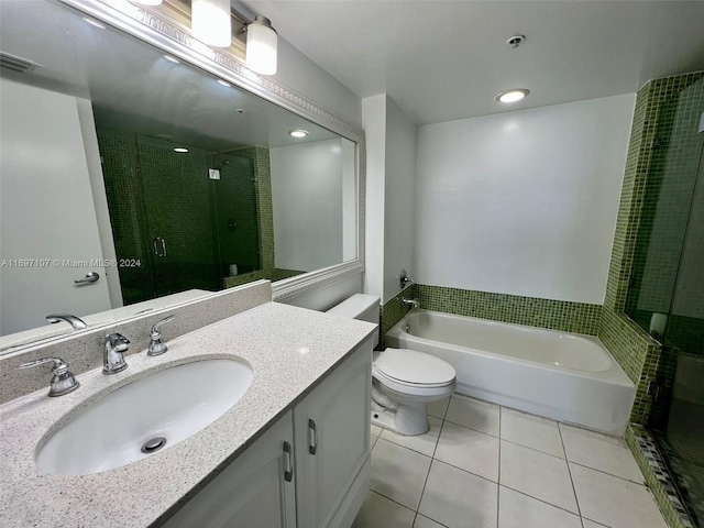 full bathroom featuring separate shower and tub, tile patterned flooring, vanity, and toilet