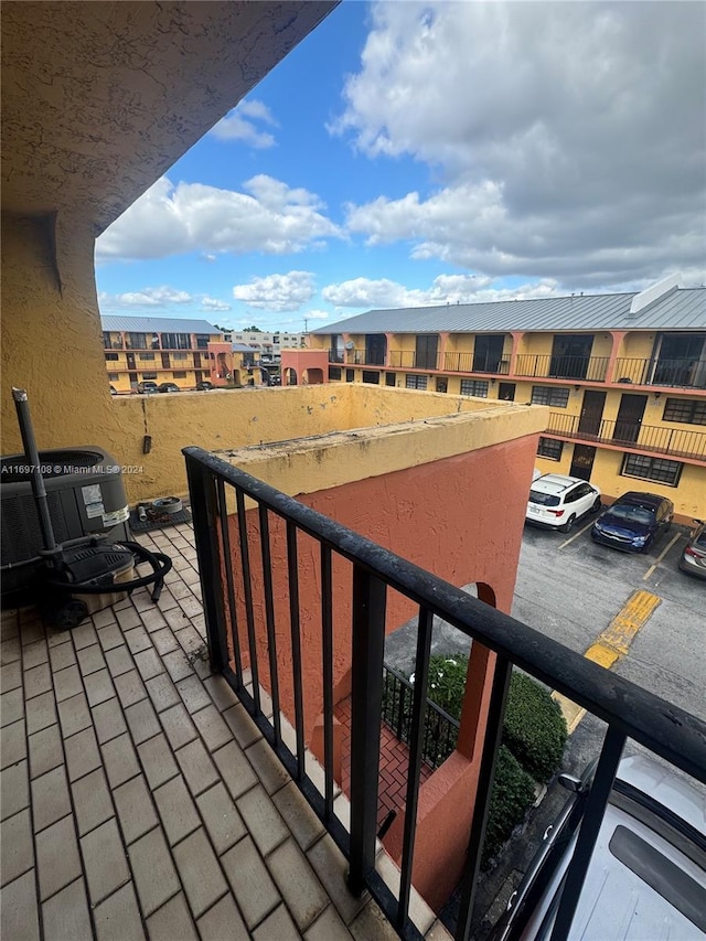 balcony featuring central AC unit