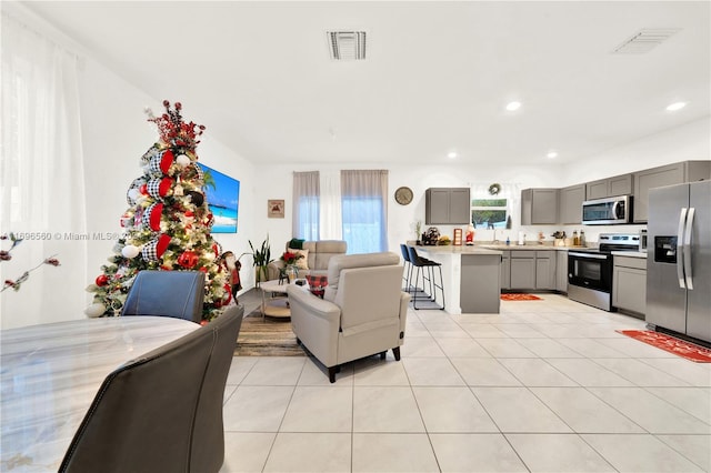 living room with light tile patterned floors