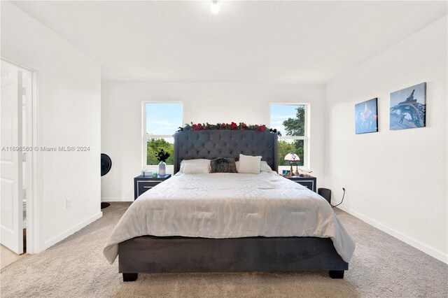 1707 SE 9th Ter, Homestead, FL 33034 - carpeted bedroom featuring baseboards