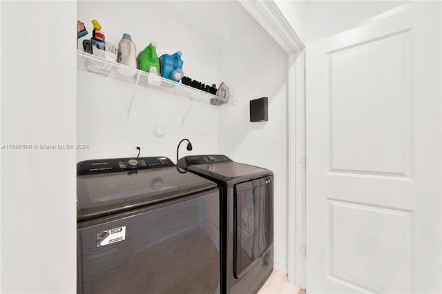 laundry area featuring separate washer and dryer