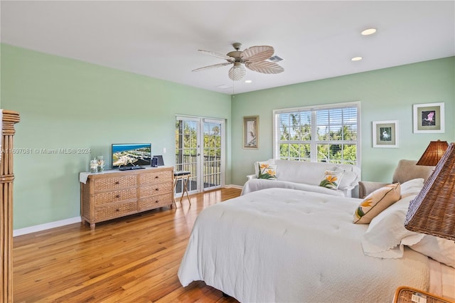 bedroom featuring ceiling fan and hardwood / wood-style floors