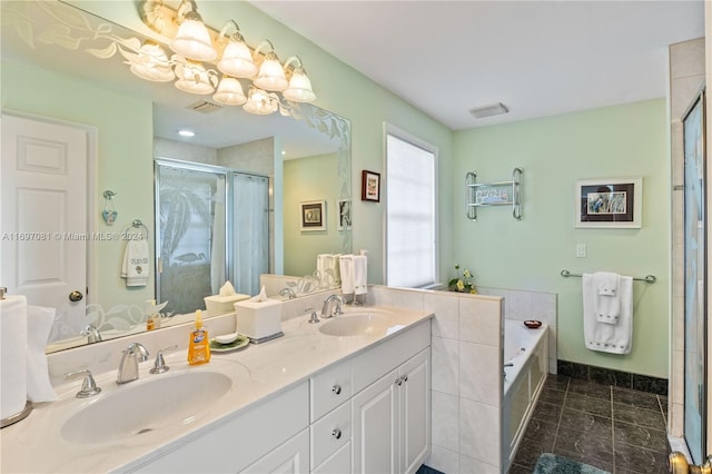 bathroom featuring vanity and plus walk in shower