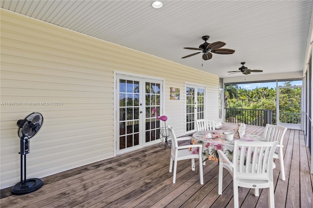 wooden deck featuring ceiling fan and french doors