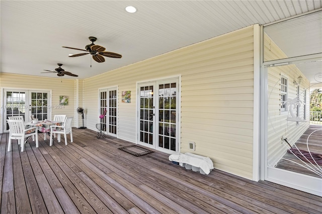 deck with ceiling fan and french doors