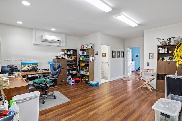 office area featuring dark hardwood / wood-style floors and a wall unit AC